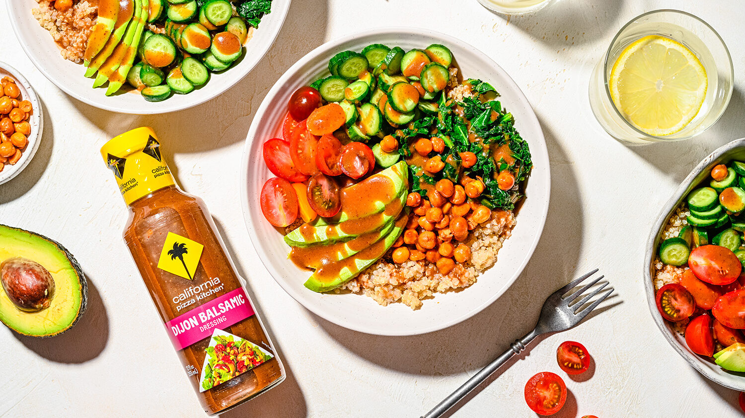 This Quinoa Bowl is made with quinoa, fresh vegetables, and California Pizza Kitchen Dijon Balsamic Dressing